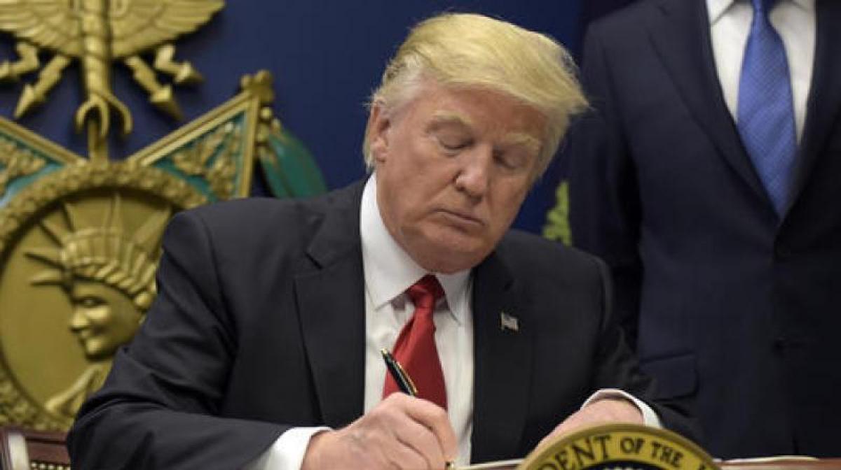 A look at Trumps executive order on refugees, immigration